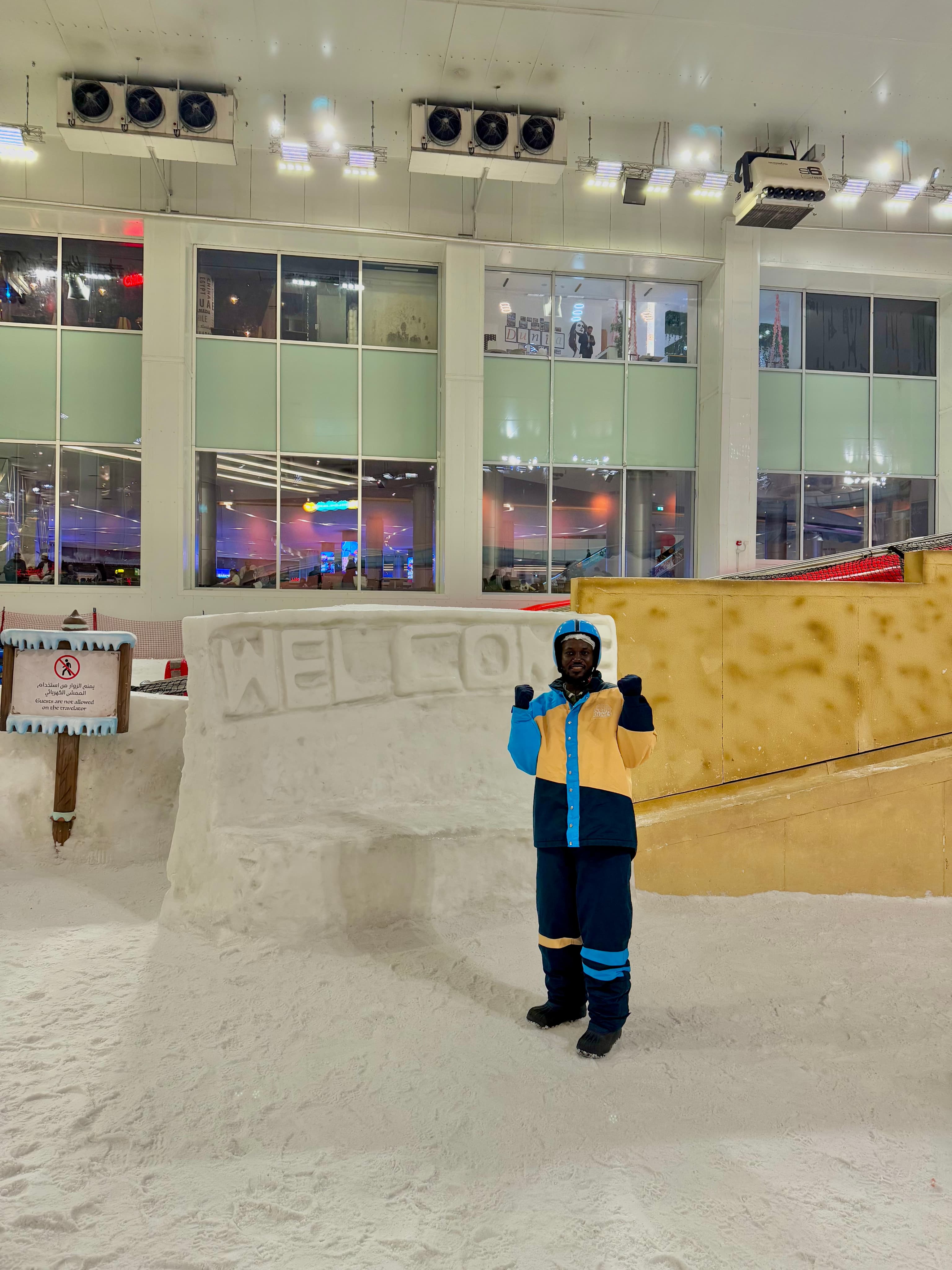 Favour standing at an indoor skating rink